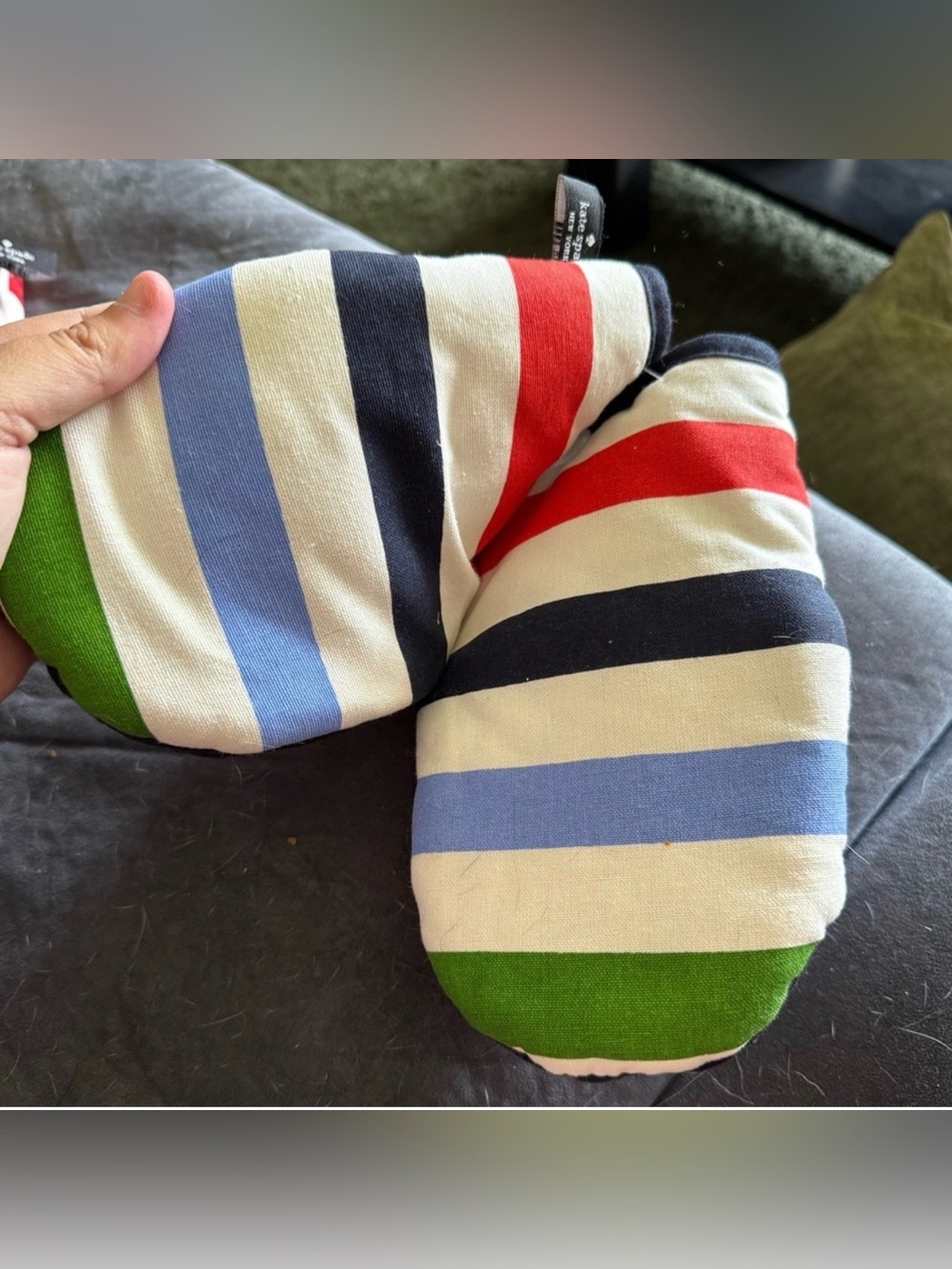 Kate Spade striped oven mitts featuring a vibrant multicolor pattern